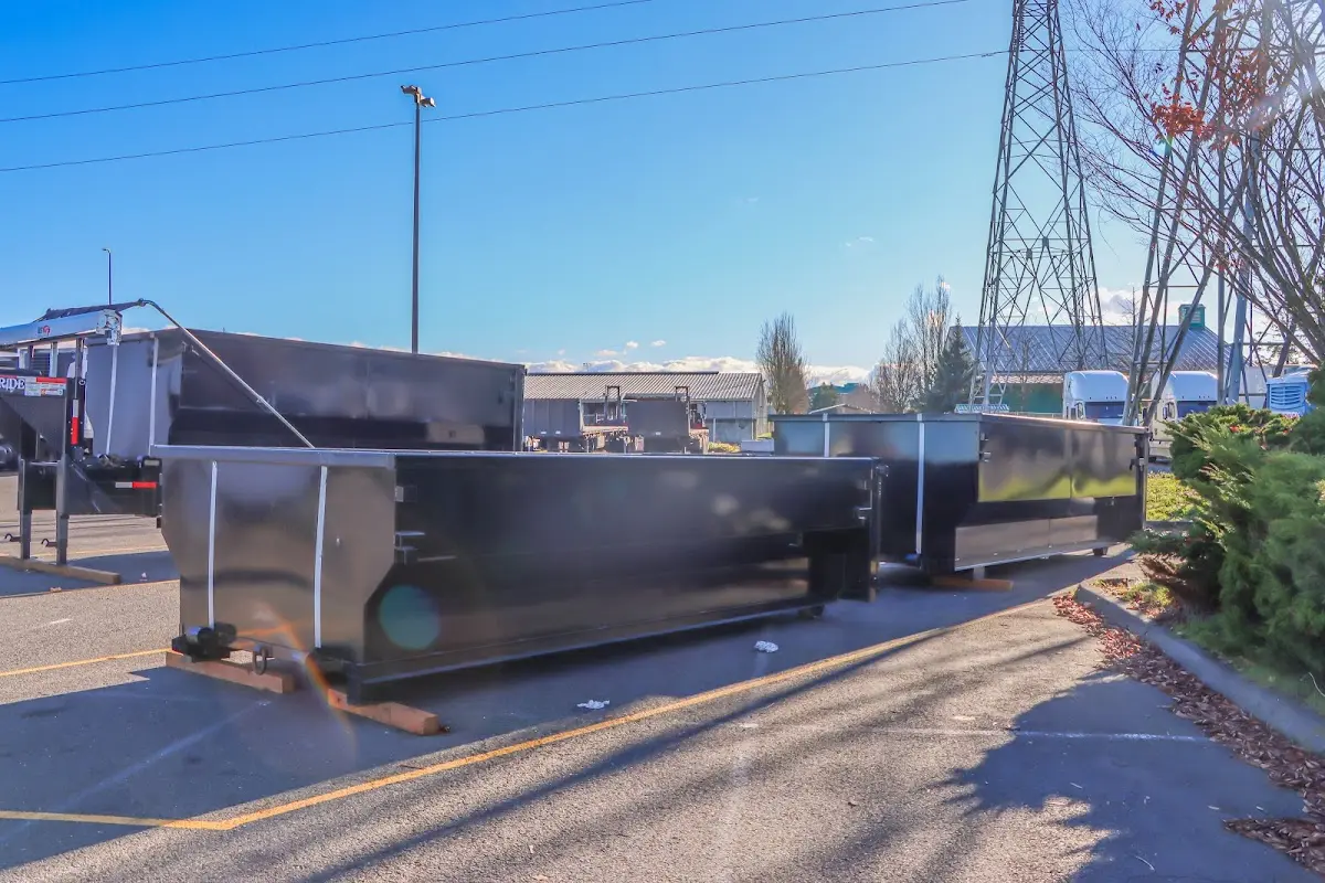 Roll-off dumpster ready for waste disposal at job site for 6 Yard Dumpster Rental in Lowell